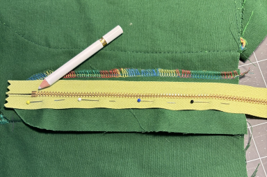 Pull the zipper over