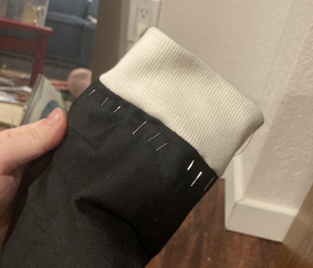 Sleeve ends pinned in place from outside